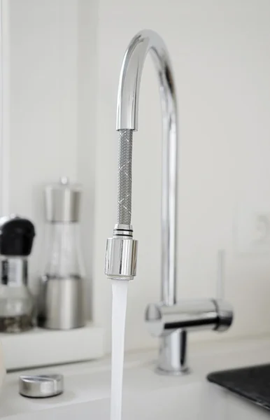 Water running from kitchen pipe — Stock Photo, Image