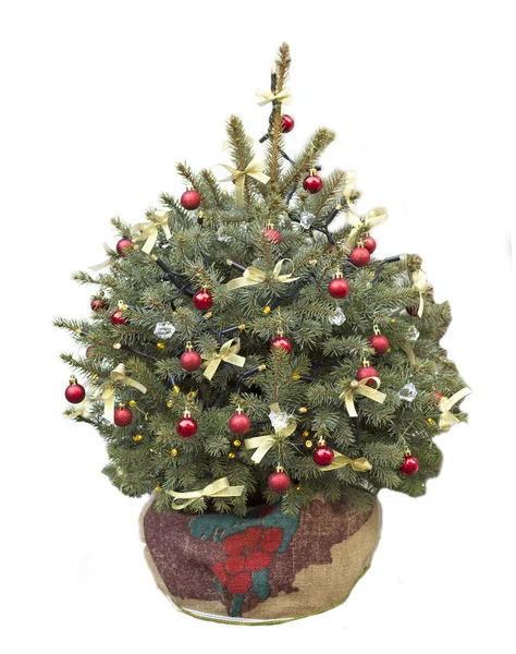 Árbol de Navidad con juguetes navideños en la bolsa con el suelo —  Fotos de Stock