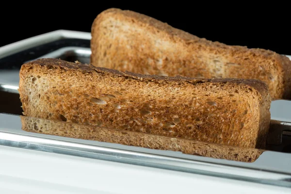 Toasted bread and toaster — Stock Photo, Image