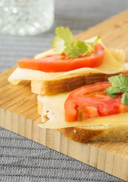 Homemade sandwich with with cheese tomatoes — Stock Photo, Image