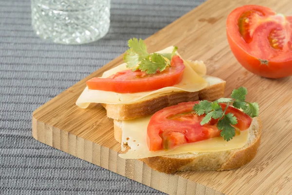 Homemade sandwich with with cheese tomatoes — Stock Photo, Image