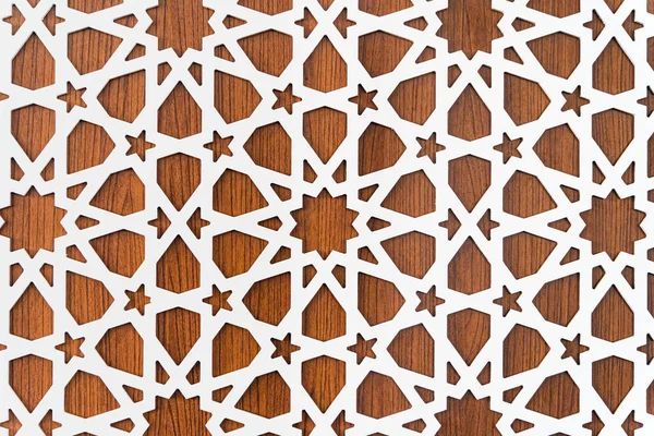 Повторяющийся узор в форме звезды на деревянном фоне Стоковое Фото