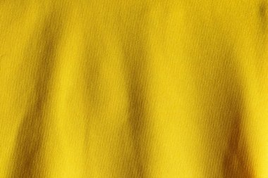 Sarı kumaş kumaş polyester doku ve tekstil arkaplan.