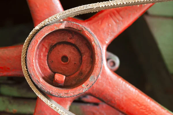Red flywheel with belt — Stock Photo, Image