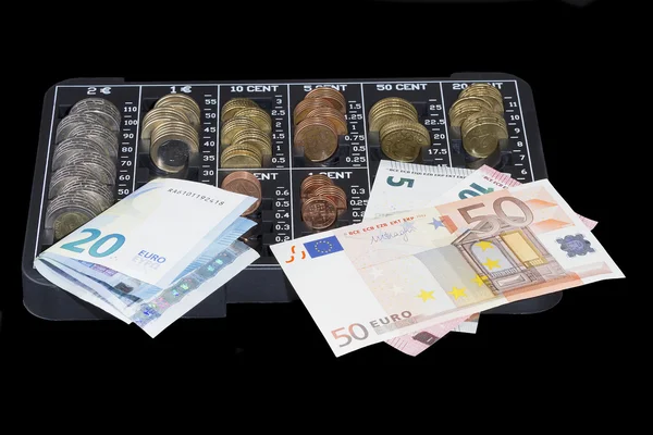 Euro bills and euro coins organizer — Stock Photo, Image