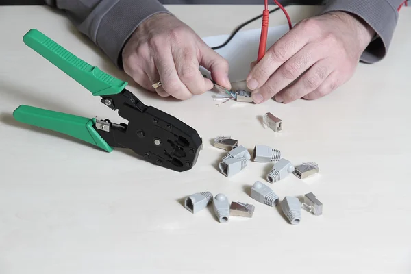Testing a RJ45 connector — Stock Photo, Image