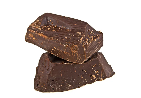 Pedaços de chocolate em um fundo branco — Fotografia de Stock