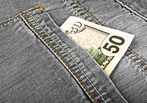 Cinquante dollars américains billets sortant du dos jeans pocke — Photo