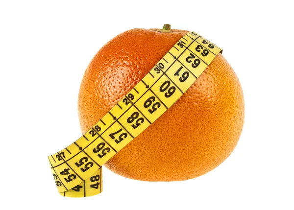 Diet concept: grapefruit and measuring tape on white background — Stock Photo, Image