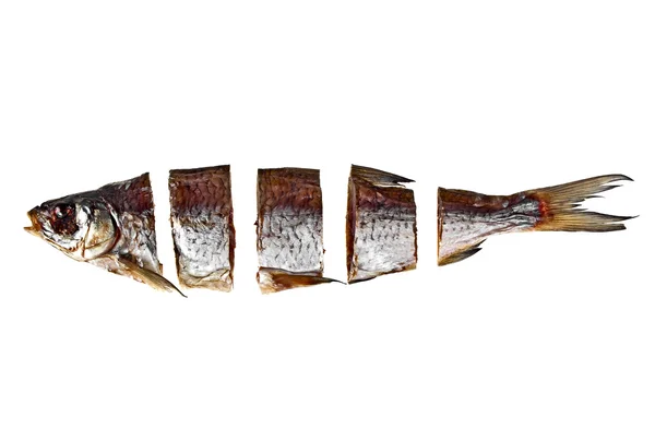 Сушені шматочки риби ізольовані на білому тлі — стокове фото
