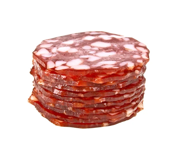 Pilha de fatias de salame isoladas em um fundo branco — Fotografia de Stock