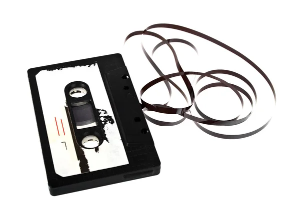 Close up de fita de áudio vintage cassete isolado em uma parte traseira branca — Fotografia de Stock