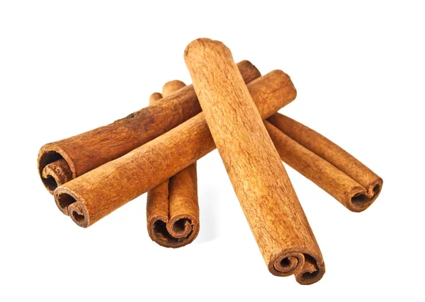 Cinnamon sticks and powder on white background — Stock Photo, Image