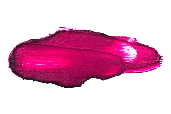 Фиолетовый цвет помады мазок на белом фоне — стоковое фото
