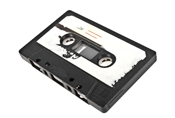 老式的录音磁带盒式白色后背上孤立的特写 — 图库照片