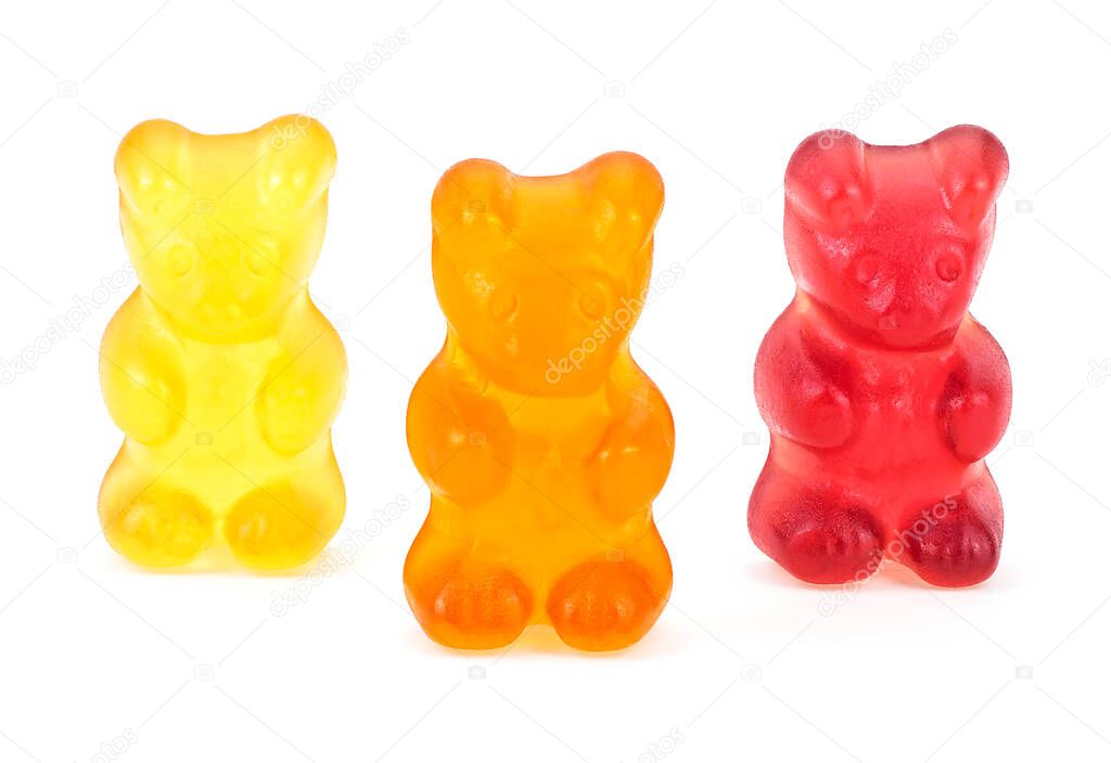 Three colorful jelly gummy bears isolated on a white background. Sweet jelly marmalade teddy bears.