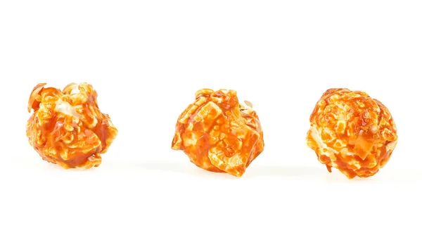 Caramel popcorn isolated on a white background, front view. Caramel coated sweet popcorn.