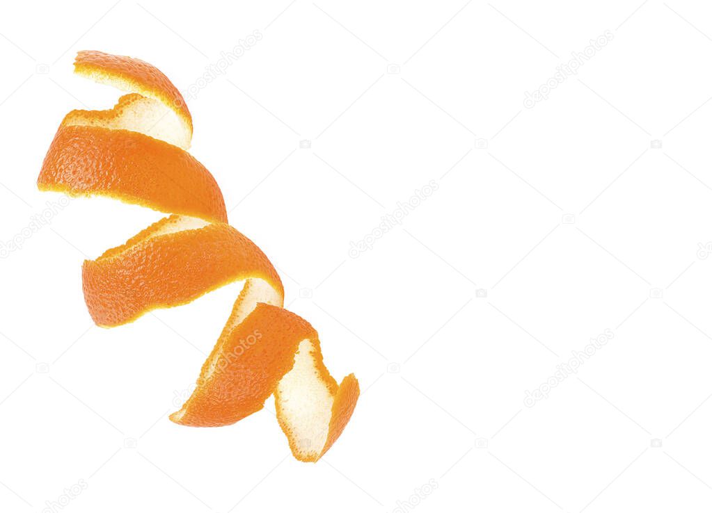 Fresh orange peel isolated on a white background, top view. Orange zest. Space for text.