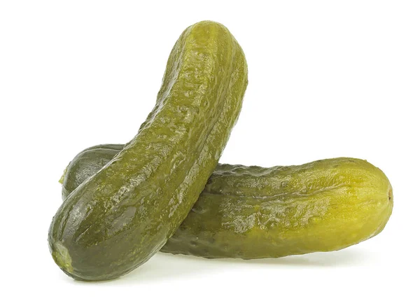 Two marinated pickled cucumbers isolated on a white background. Delicious pickled cucumbers.