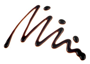 Beyaz arka planda koyu çikolata sosu sosu kıvrımları var..