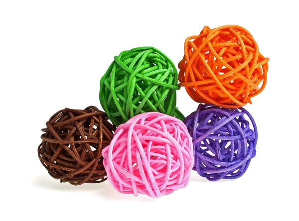 Colored wicker bamboo balls on a white background — Stock Photo, Image