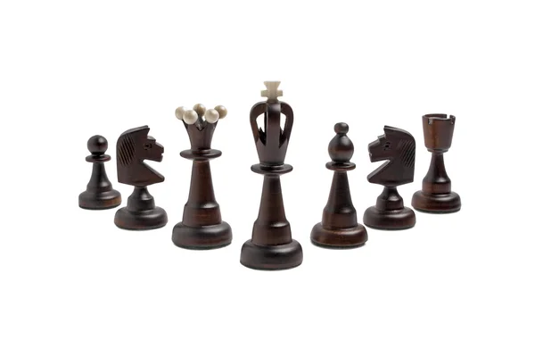 Black chess pieces on a white background — Stock Photo, Image