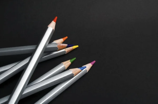 Colored pencils isolated on black background — Stock Photo, Image