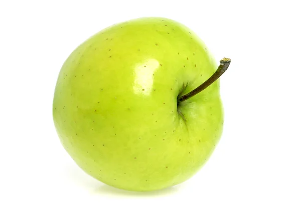 Manzana verde fresca sobre un fondo blanco — Foto de Stock