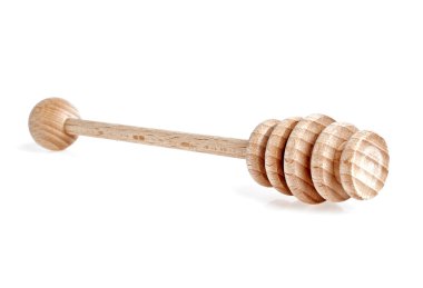 Beyaz arka planda bal için tahta kaşık