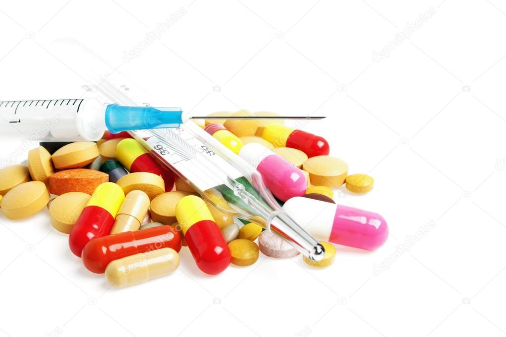 Medical thermometer, syringe and pills