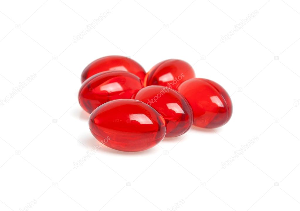 Pills of vitamin E isolated on white background 