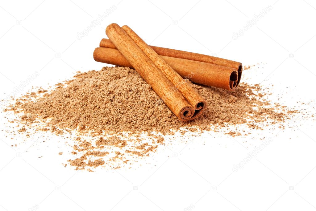 Cinnamon sticks and powder on a white background