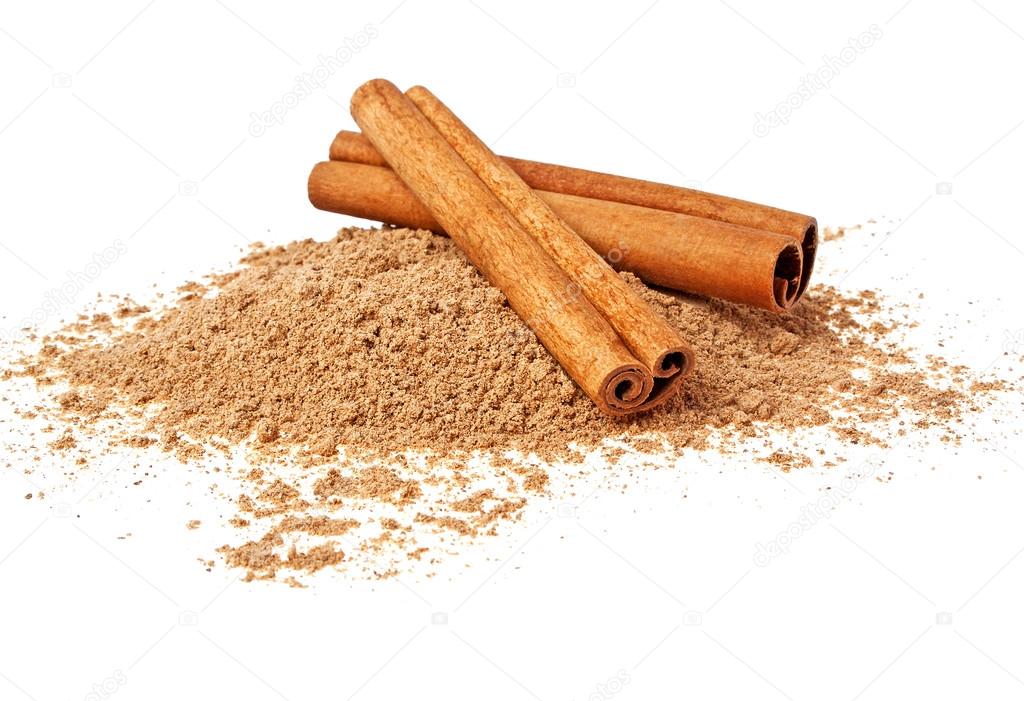 Cinnamon sticks and powder on a white background