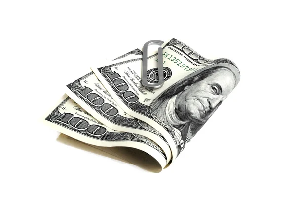 Peníze klip s dolary na bílém pozadí — Stock fotografie