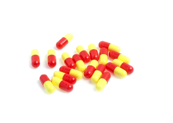 Colored pills on a white background — Stock Photo, Image