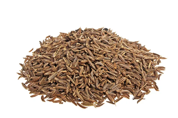 Mucchio di semi di cumino su fondo bianco — Foto Stock