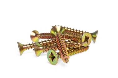 beyaz zemin üzerine altın vidalar