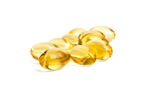 Beyaz arka plan üzerinde gelen balık yağı Omega 3 kapsülleri