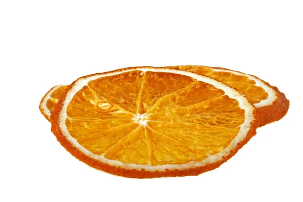 Getrocknete Orangenscheiben isoliert auf weißem Hintergrund — Stockfoto