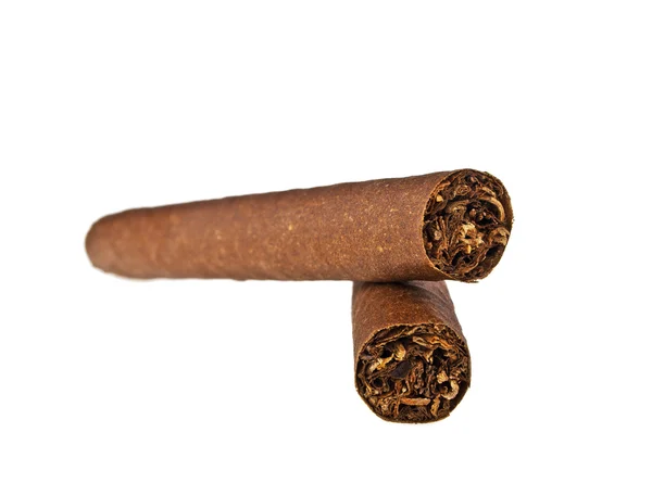 Två cigarrer, en på en annan, på vit bakgrund — Stockfoto