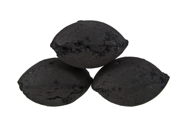 Briquetts Coco węgiel na białym tle — Zdjęcie stockowe