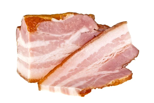 Bacon et tranches de bacon sur fond blanc — Photo
