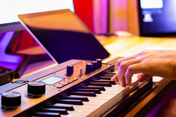 Male Musician Hand Playing Midi Keyboard Arranging Music Laptop Computer Royalty Free Stock Photos
