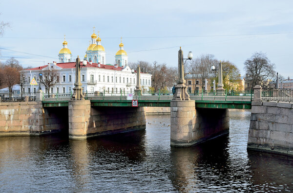 ST.PETERSBURG, RUSSIA, OCTOBER, 25, 2014. Russian scene: Krasnogvardeisky bridge over the Griboedov channel and Nikolsky Cathedral, St. Petersburg