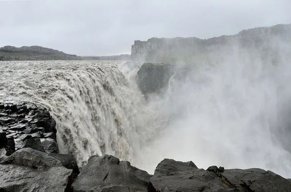 The waterfall Dettifoss (ISL. Dettifoss waterfall) on the river Gecolsa-AU-Fiedler in rainy weather, Iceland Obrazek Stockowy