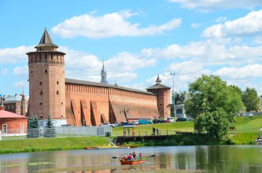 Kolomna, Moscow region, Russia, June, 29, 2014, People ride on the boat near ancient Kolomna kremlin