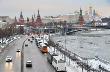 Moscow, Russia, Desember 27,2014, Russian scene: Movement of cars on Prechistenskaya embankment near Moscow kremlin