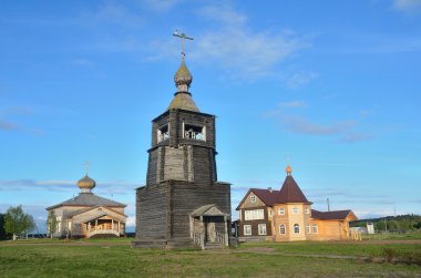 Russia, Murmansk region, Tersky district. Coast of the Kola Peninsula on the White sea. The Village Of Varzuga. The Church of the Dormition, built in 1674 clipart