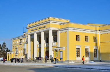 Barnaul, Russia, January, 13, 2016. People walking near the youth theatre of Altai in Barnaul