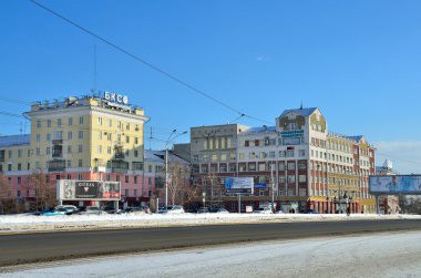 Barnaul, Russia, January, 13, 2016. The Lenin Avenue in Barnaul, the buildings of BCS investment Bank and Financial University